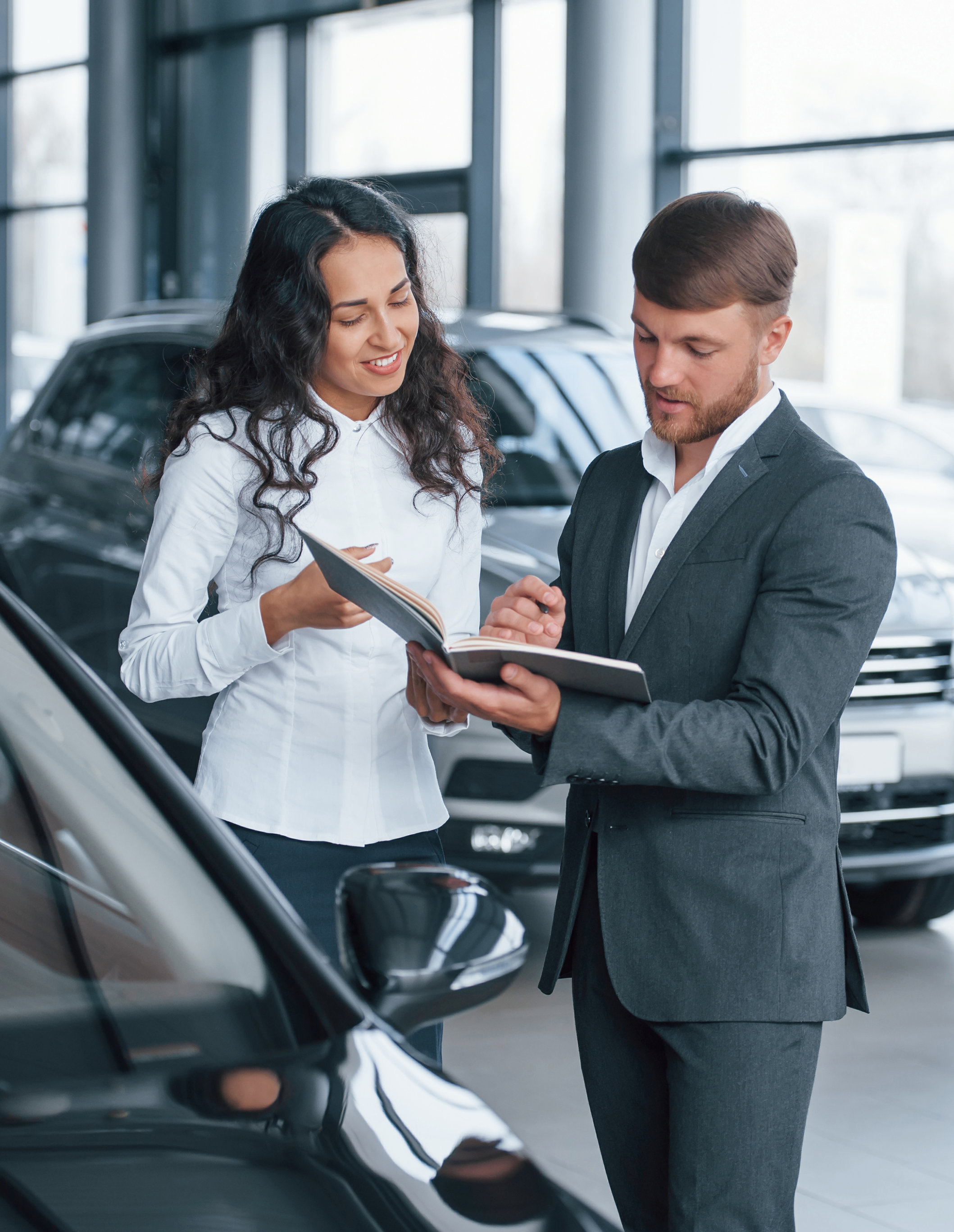 where-i-need-sign-female-customer-modern-stylish-bearded-businessman-automobile-saloon 1